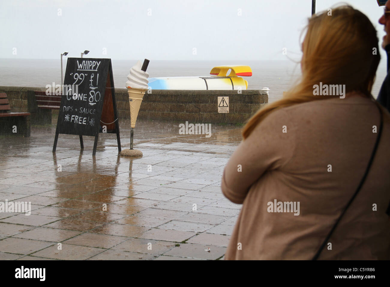 Very wet weather on sea front. Stock Photo
