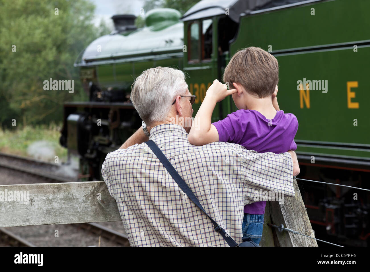 Young and old railway enthusiasts Stock Photo - Alamy