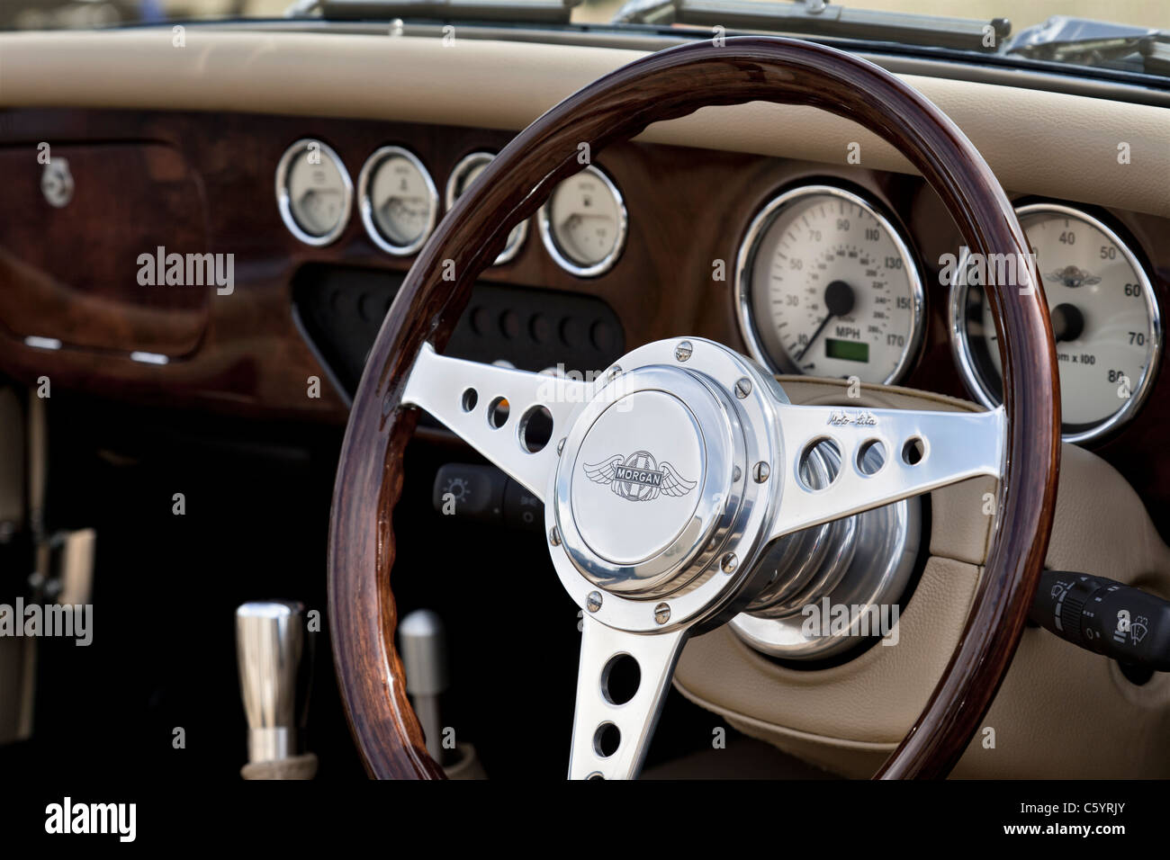 Steering wheel and dashboard of Morgan Plus Four sportscar Stock Photo