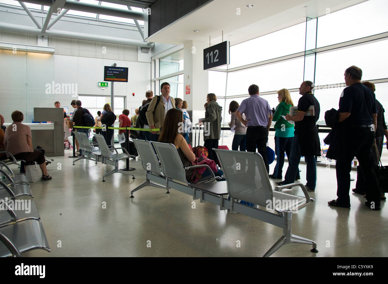 Passengers queue for boarding at Ryanair gate at Dublin T1 Stock Photo