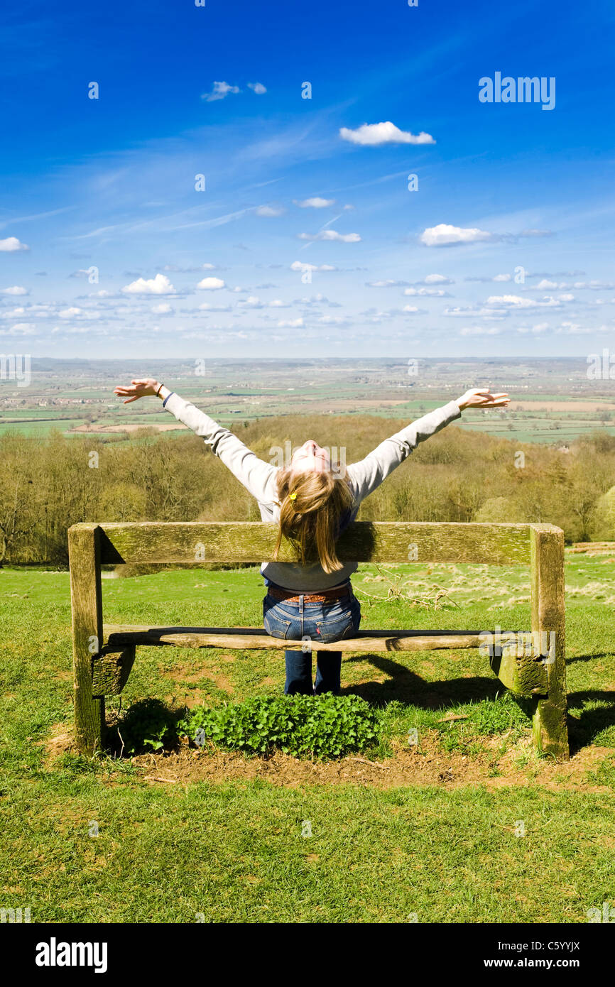 Young Woman Outdoors Celebrating a Success Or Worshiping God Stock Photo