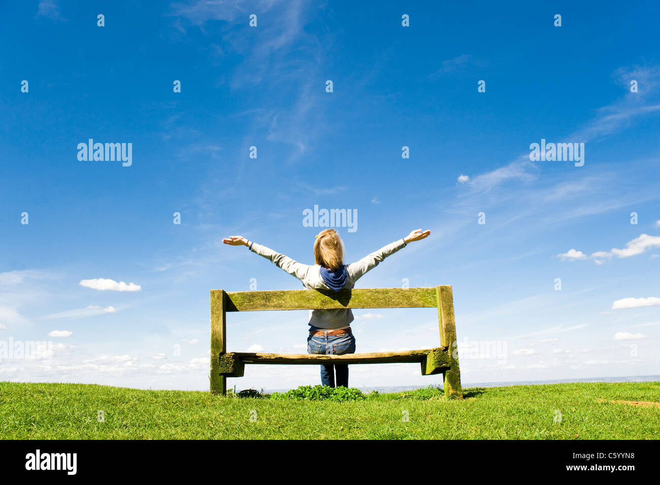 Young Woman Outdoors Celebrating a Success Or Worshiping God Stock Photo