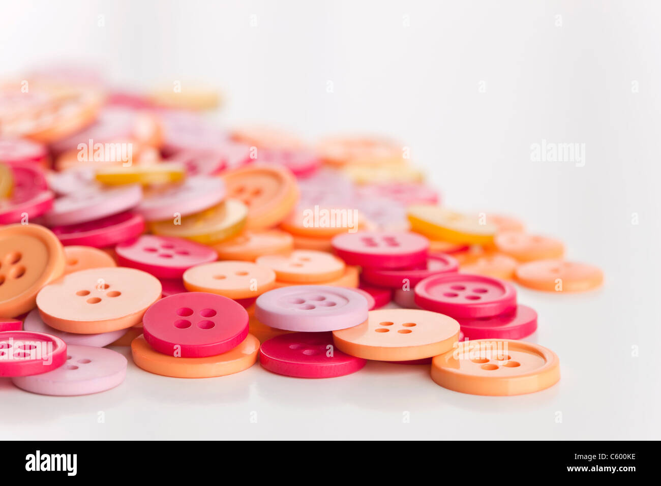 Pile of multi colored buttons Stock Photo