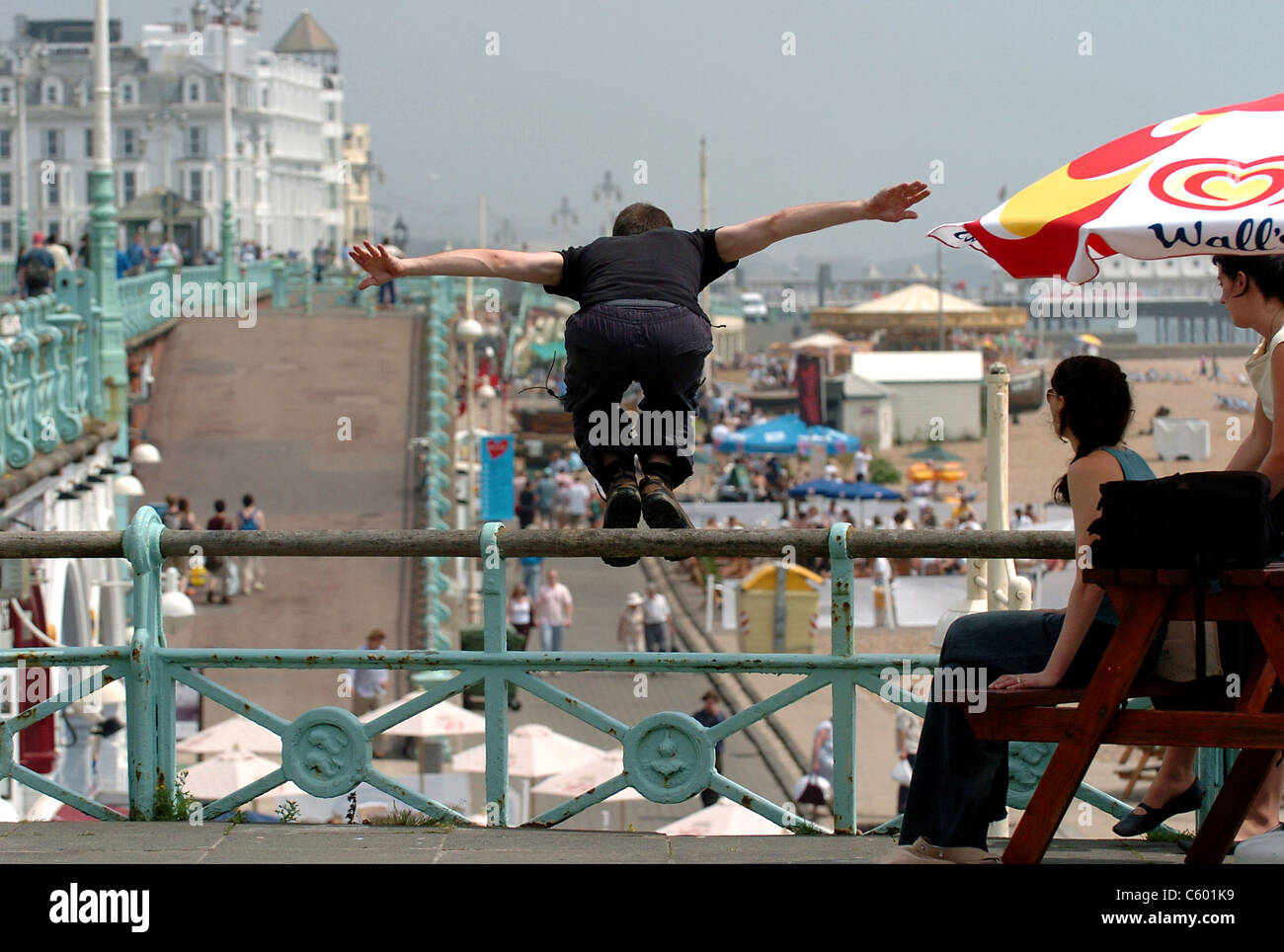 Man jumping over railings hires stock photography and images Alamy