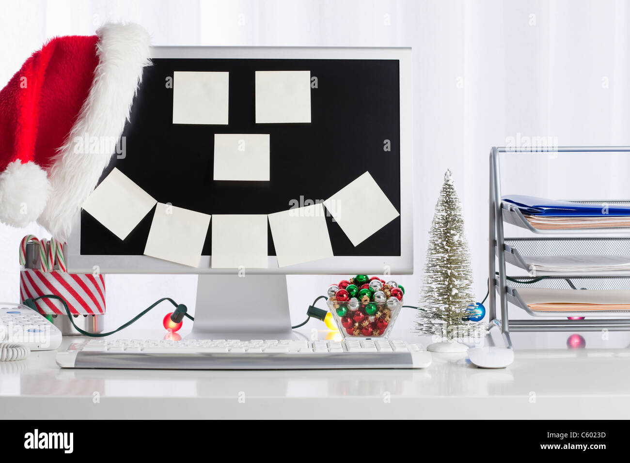 Studio Shot Of Desktop Pc With Christmas Decorations Stock Photo