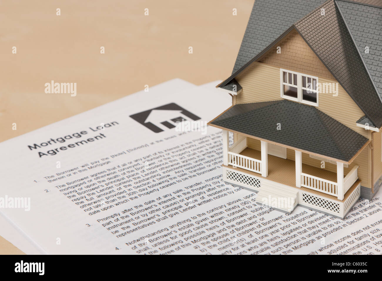 Model house on mortgage document Stock Photo