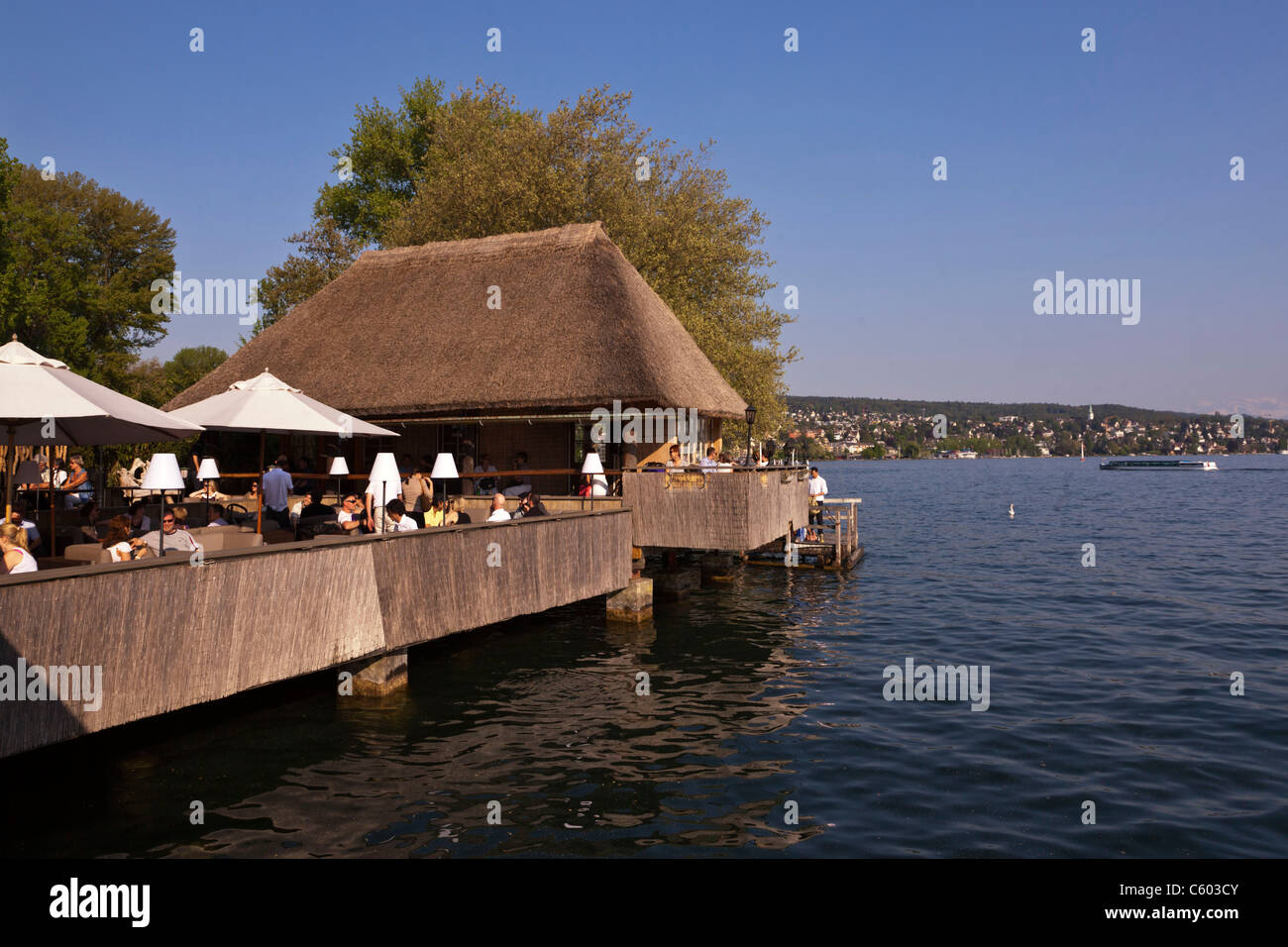 Fischerhuette at Zurich lake, Switzerland Zuerich, lake promenade , people , Stock Photo