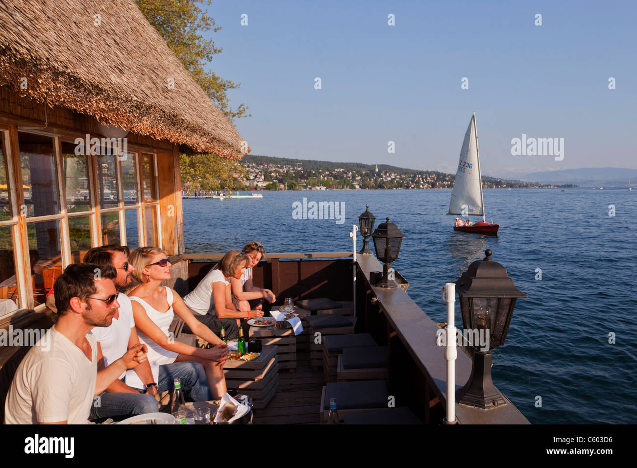 Fischerhuette at Zurich lake, Switzerland Zuerich, lake promenade , people , Stock Photo