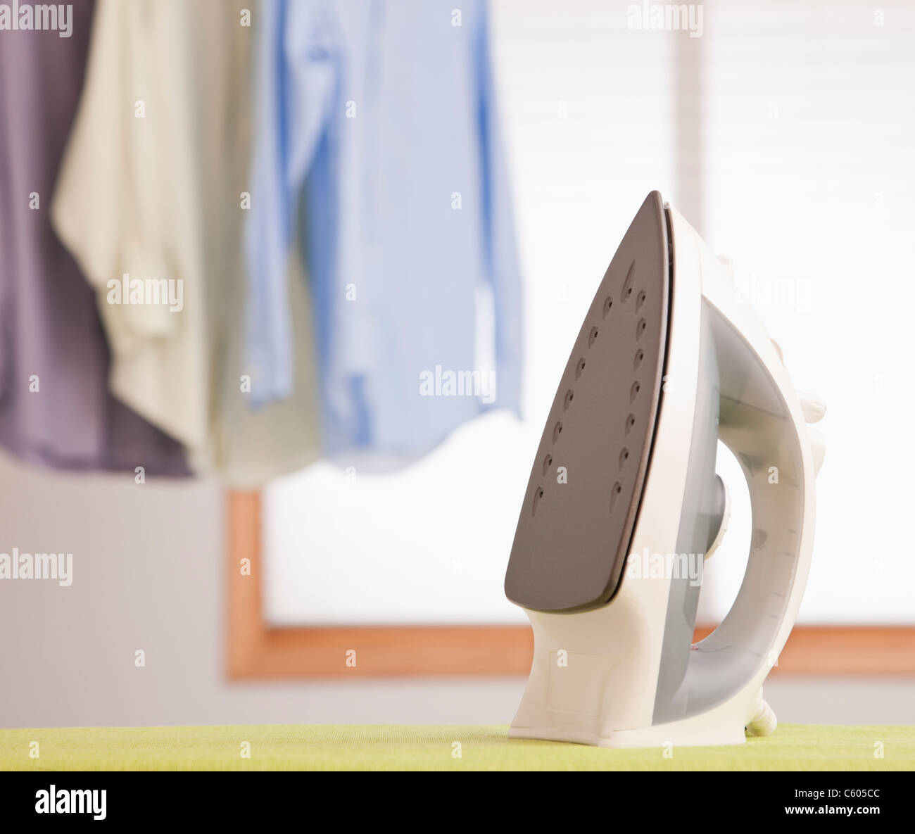 Ironing pressing cloth hi-res stock photography and images - Alamy
