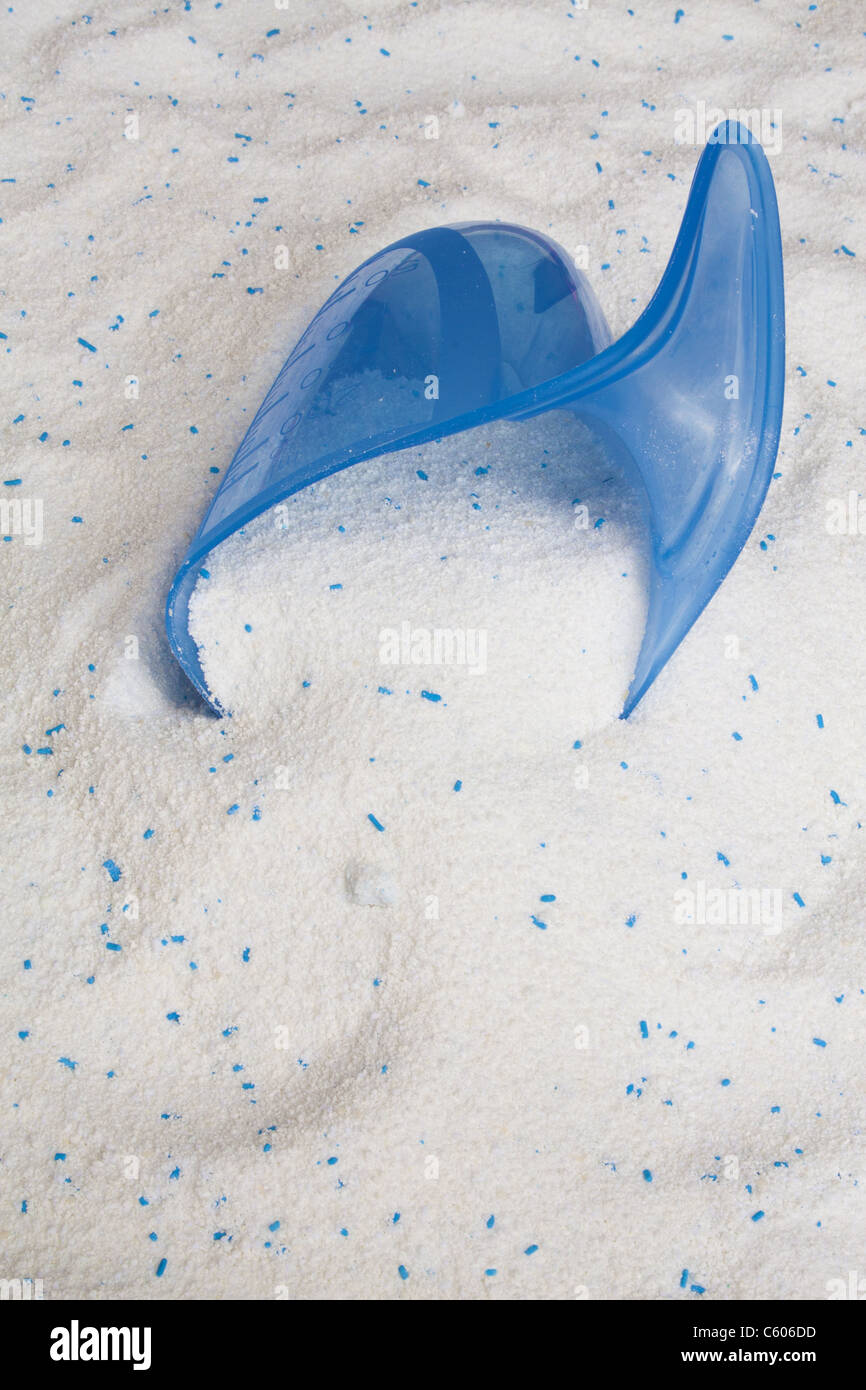 Laundry detergent powder for washing machine and blue plastic scoop for
