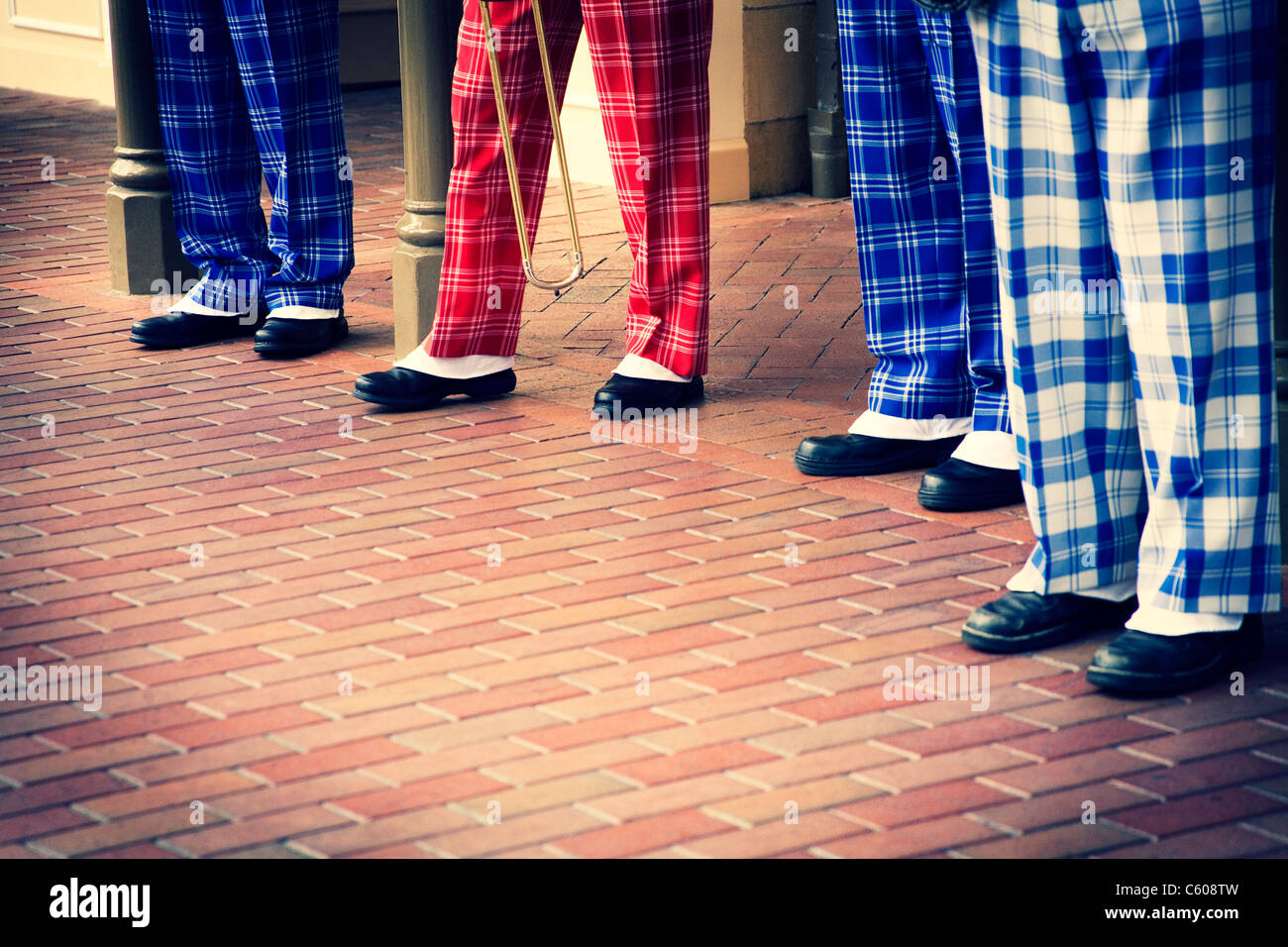 The feet of a jazz band dressed in period costumes. Stock Photo