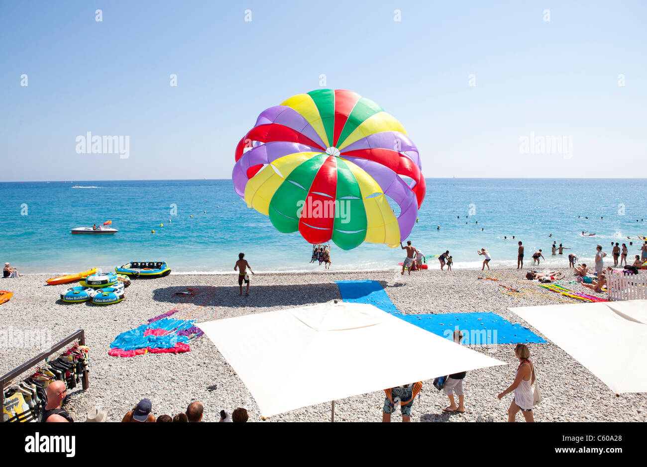 Parasailing on beach, Nice, France Stock Photo Alamy
