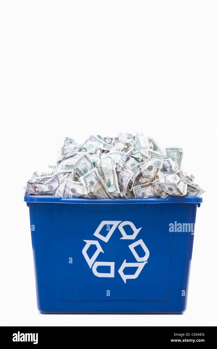 USA, Illinois, Metamora, Recycling bin full of US money Stock Photo