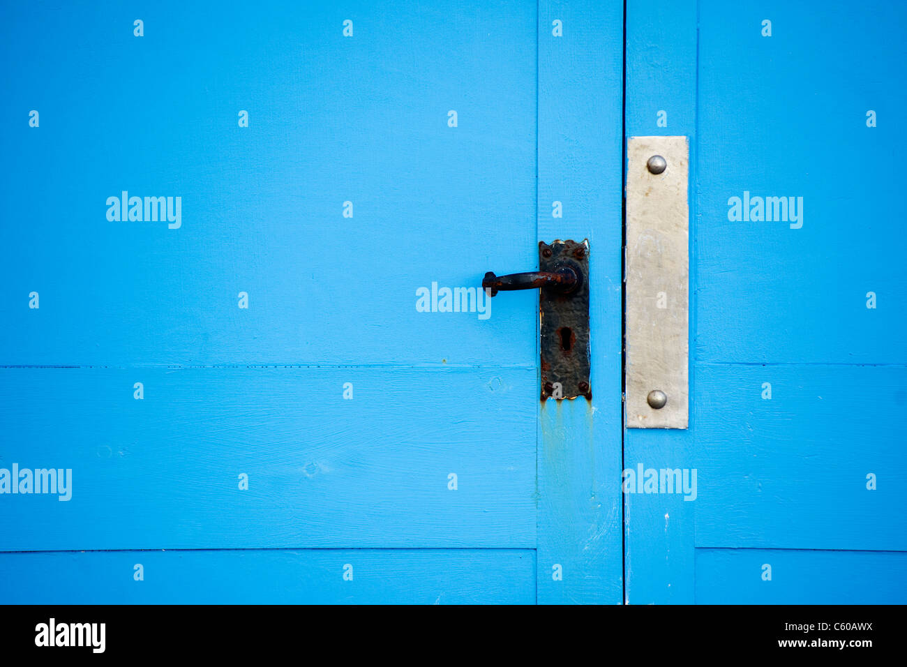 Bright blue beach hut door close up Stock Photo