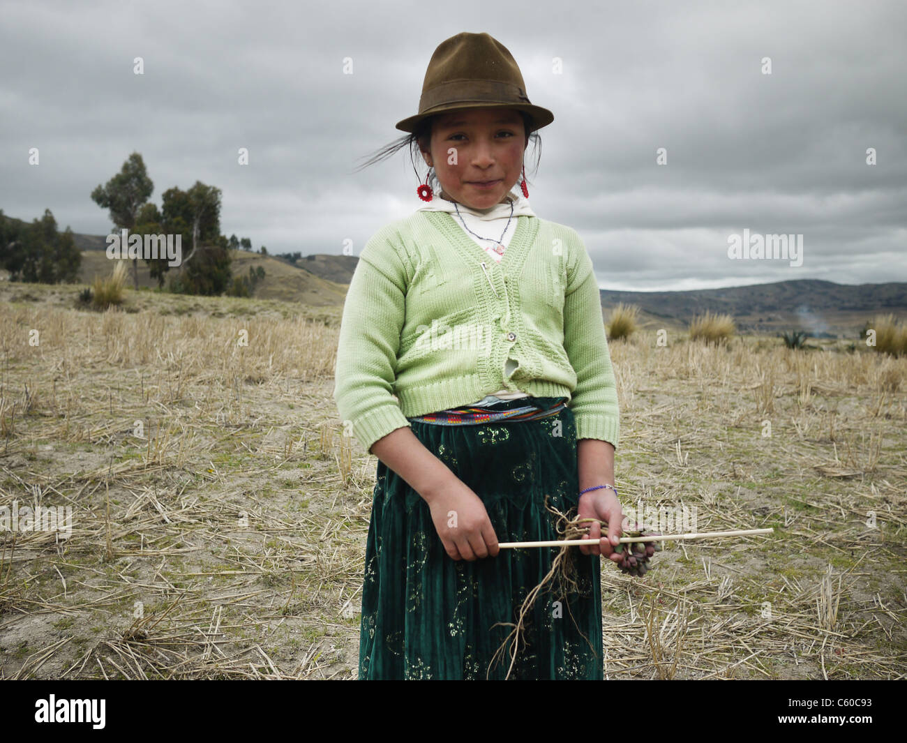 Portrait of an indigenous girl high in the Andes Mountains of South America. Stock Photo