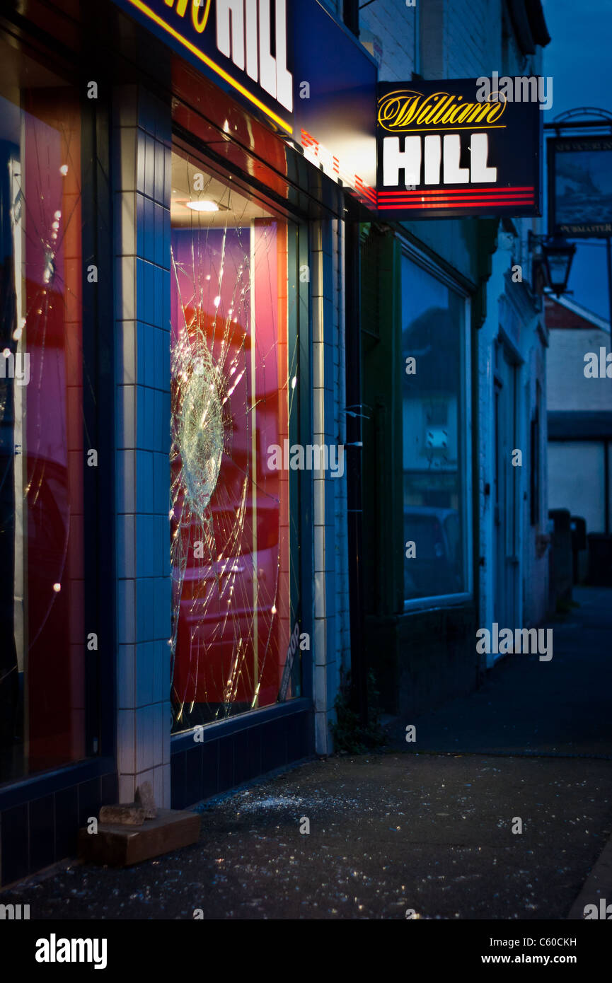 Damage to William Hill bookmakers, Tredworth, Gloucester during the Riots of 2011 Stock Photo