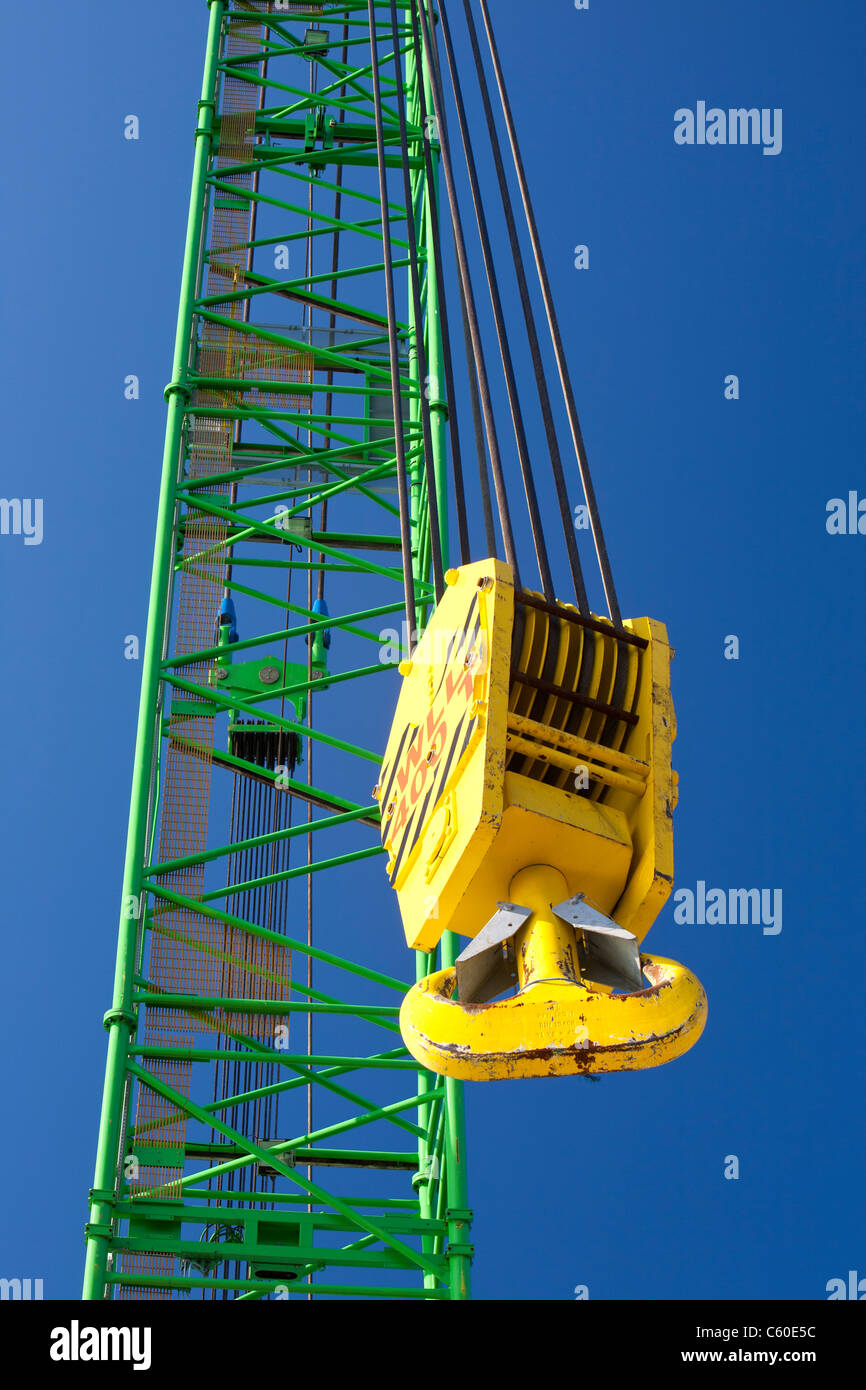 A crane on a jack up barge that is constructing the Walney offshore wind farm. Stock Photo