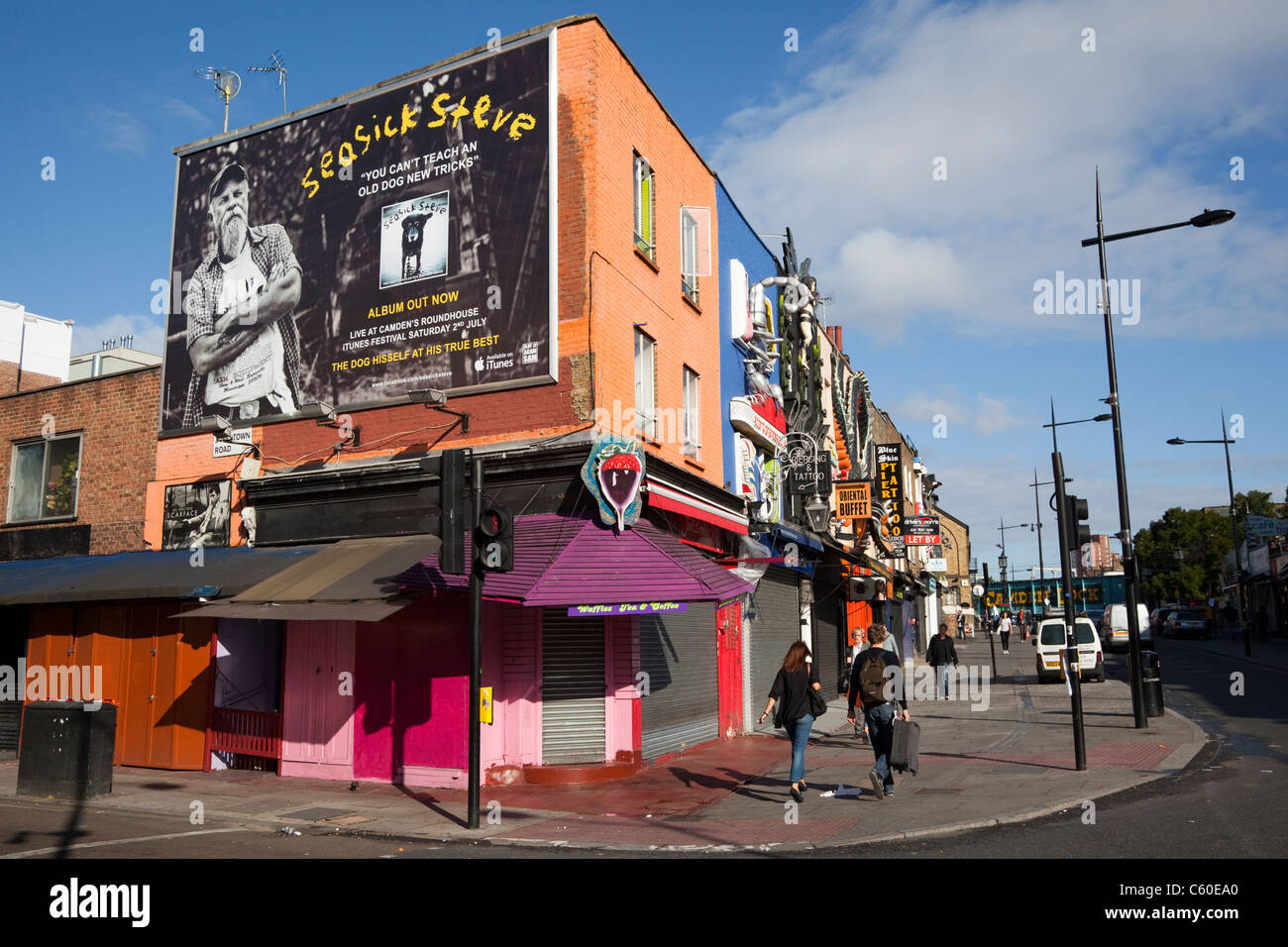 Colourfully decorated shops in Camden High Street in the Camden Market ...