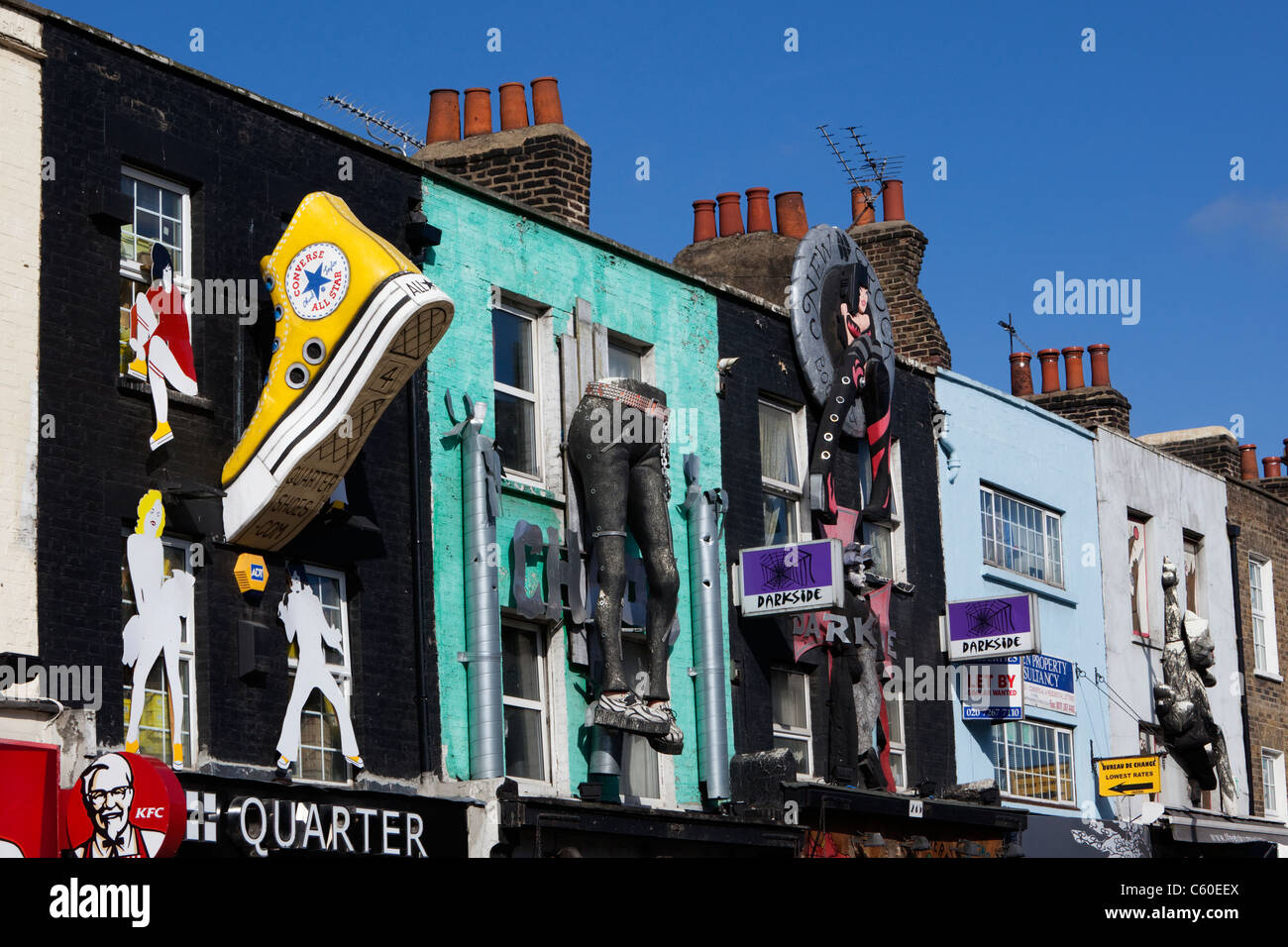 Colourfully decorated facades above shops in Camden High Street in the ...