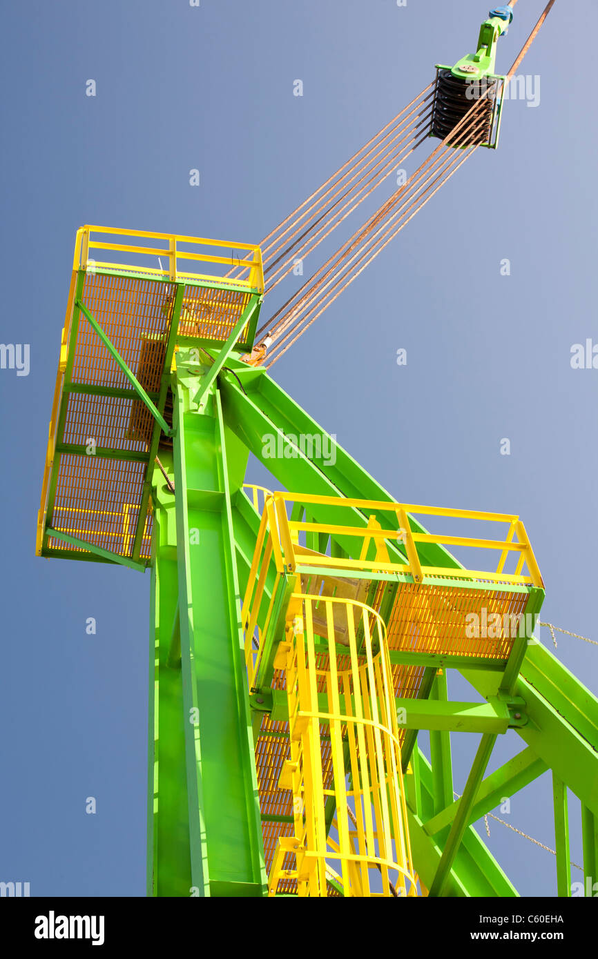 A crane on a jack up barge that is constructing the Walney offshore wind farm. Stock Photo