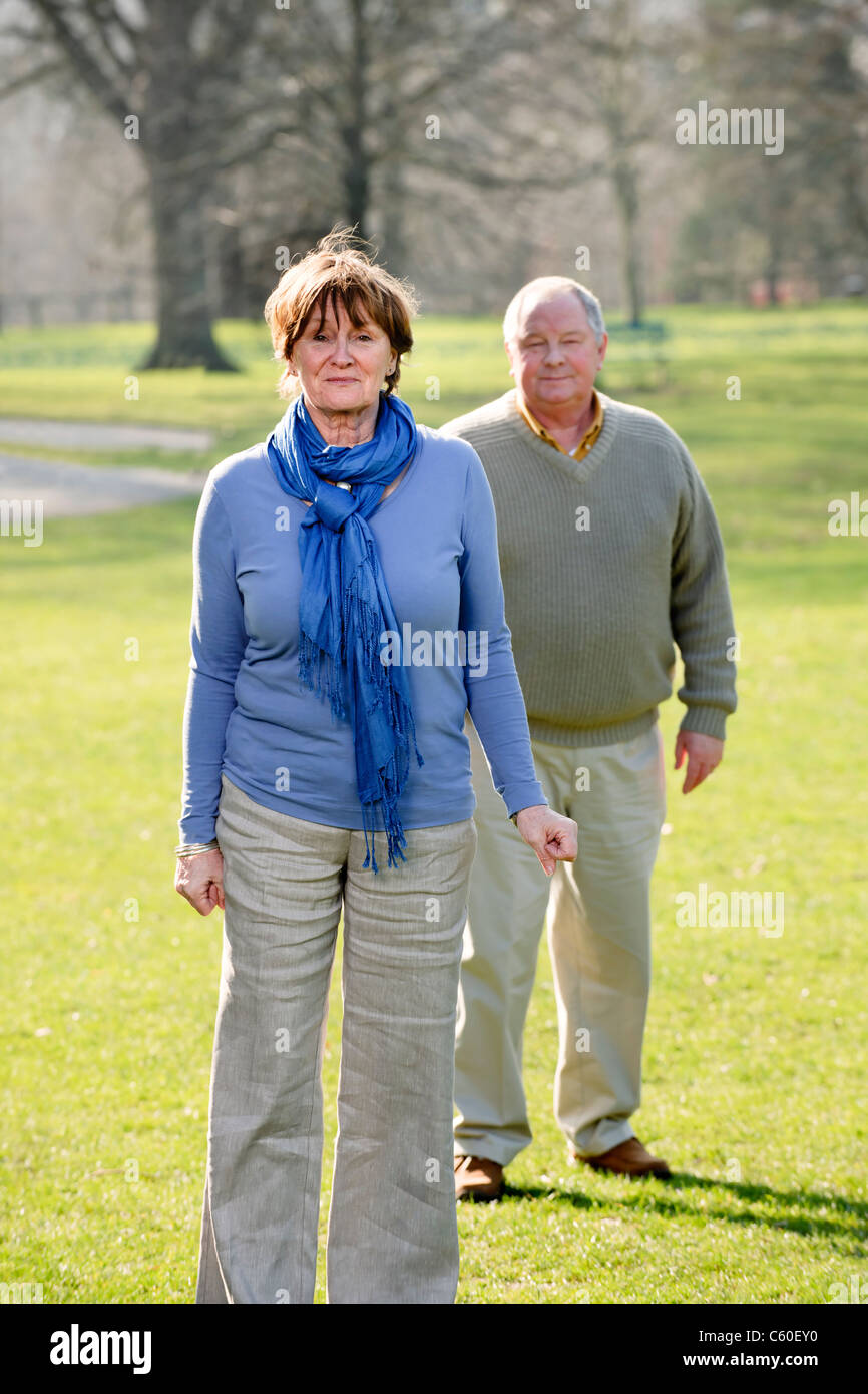 Older couple walking in park Stock Photo - Alamy