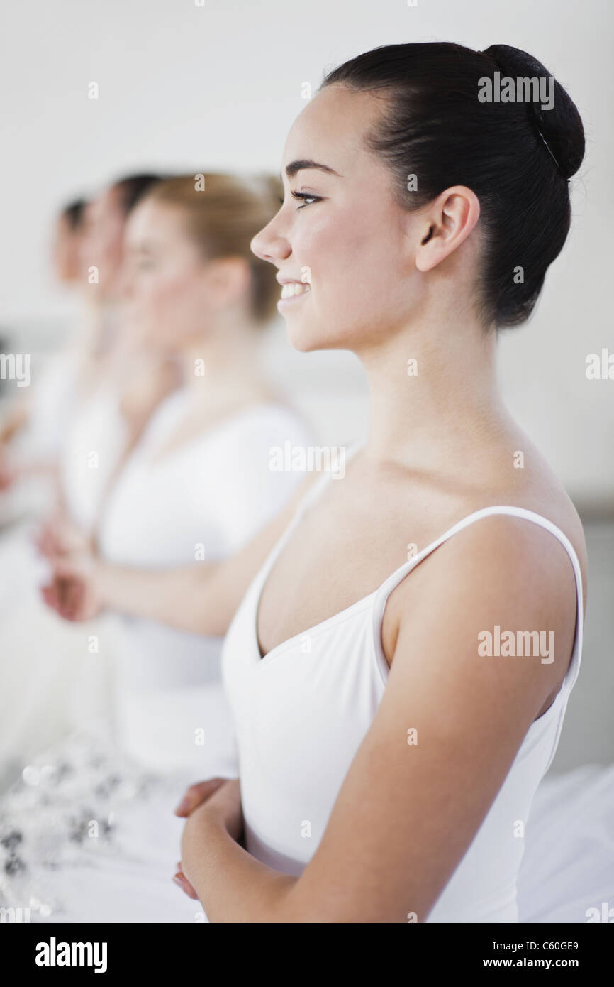 Ballet dancers holding hands in studio Stock Photo - Alamy