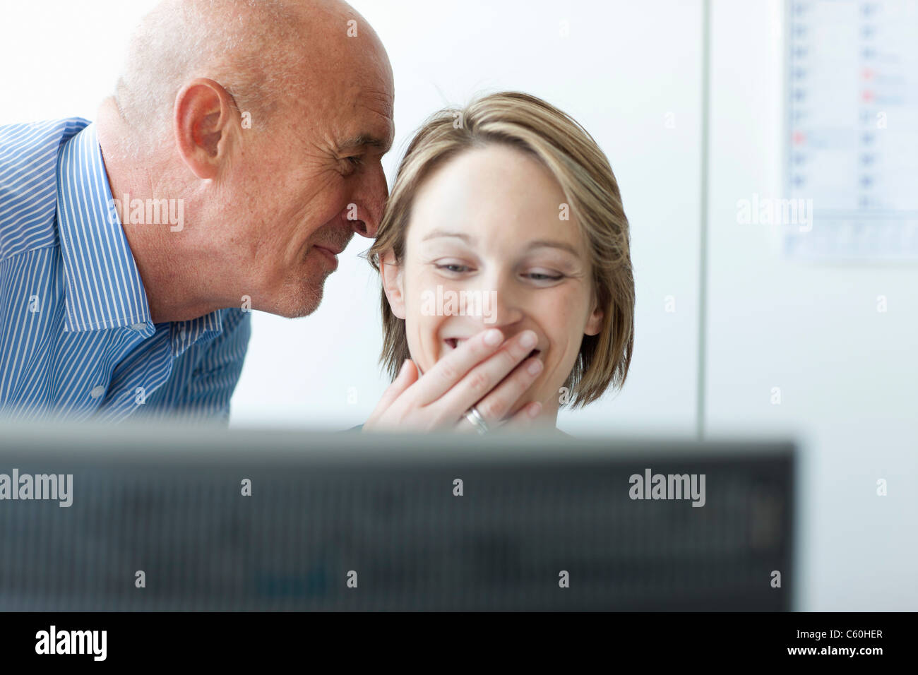 Business people using computer in office Stock Photo - Alamy