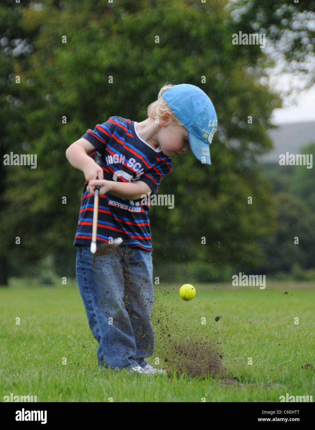 Toddler/ two year old playing golf Stock Photo Alamy