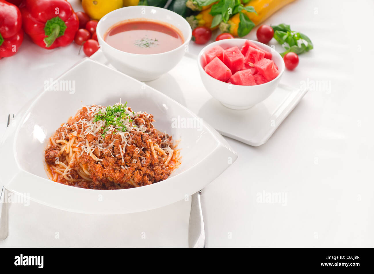 Italian classic spaghetti with bolognese sauce and fresh vegetables on background,MORE DELICIOUS FOOD ON PORTFOLIO Stock Photo