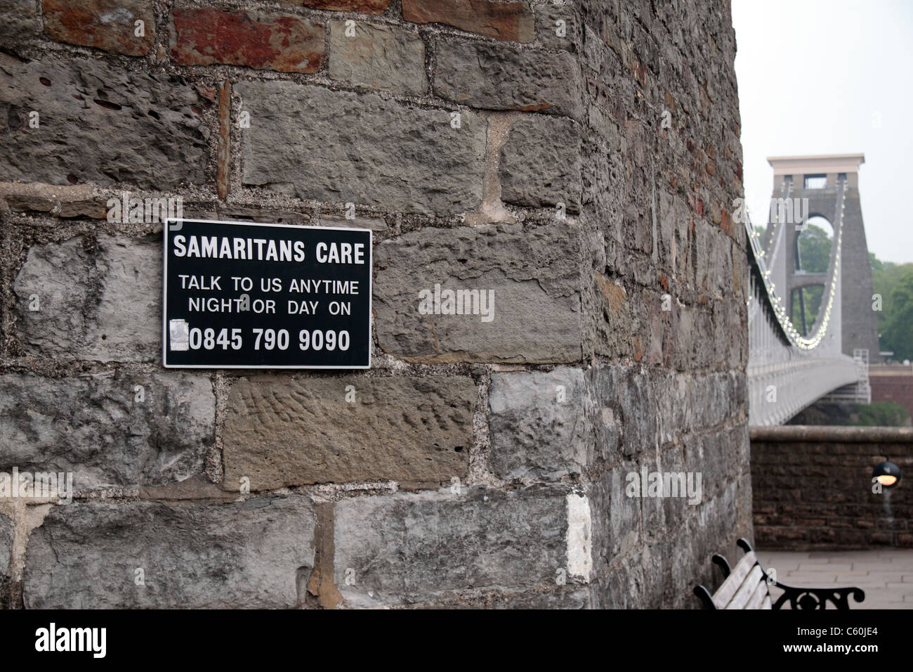 One of several Samaritans signs, attempting to prevents suicides, on the Clifton Suspension Bridge, Bristol, England. Stock Photo