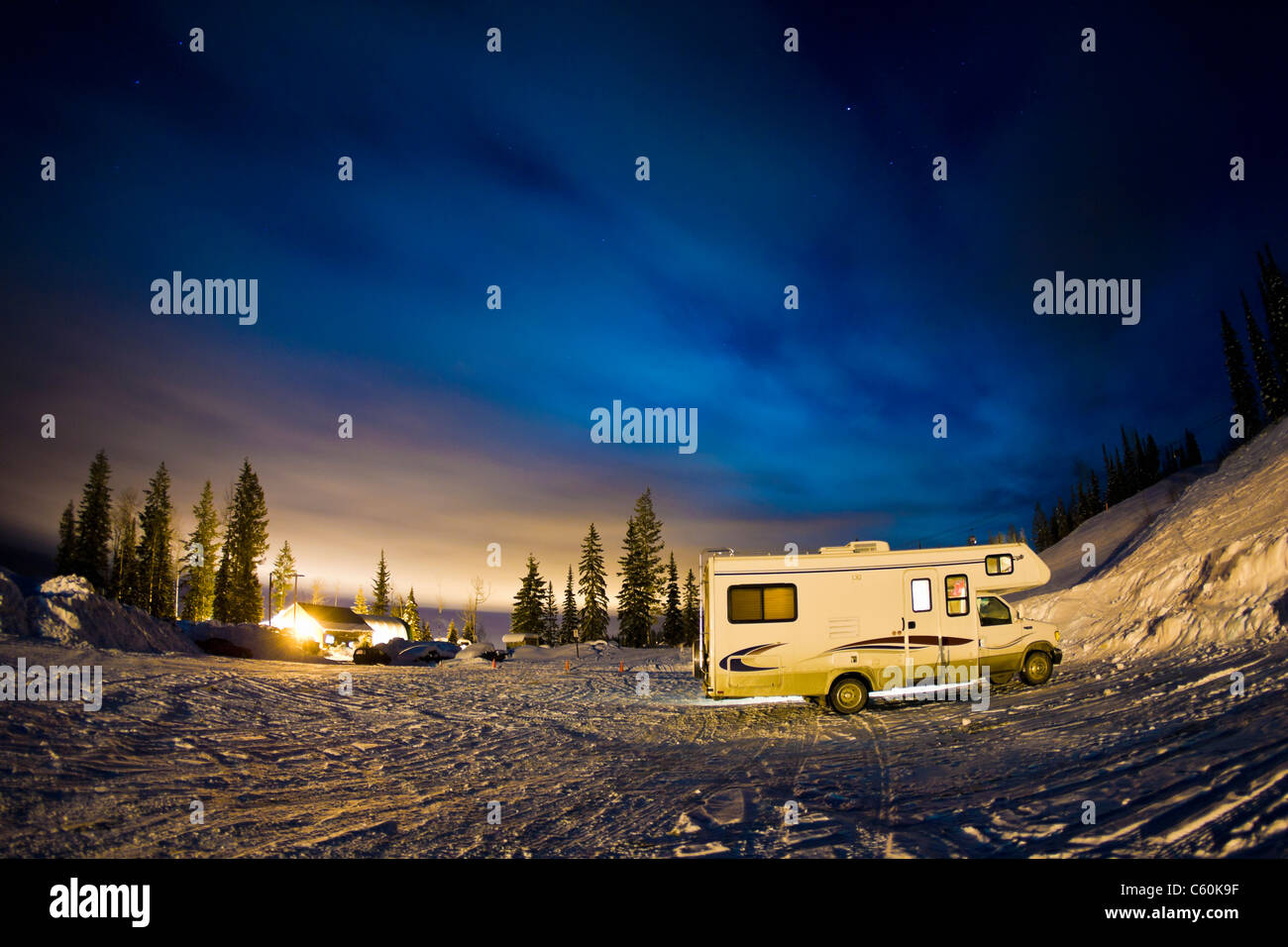 Recreational vehicle parked on hillside Stock Photo