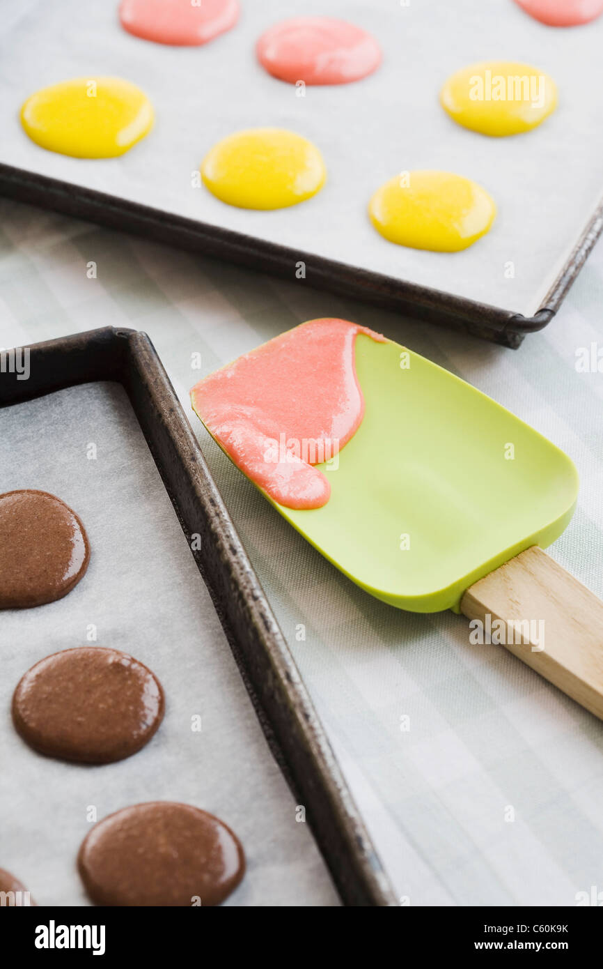 Batter on cookie sheets and spatula Stock Photo
