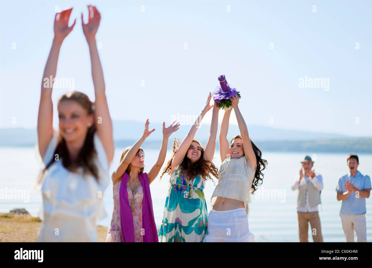Woman catching wedding bouquet hires stock photography and images Alamy