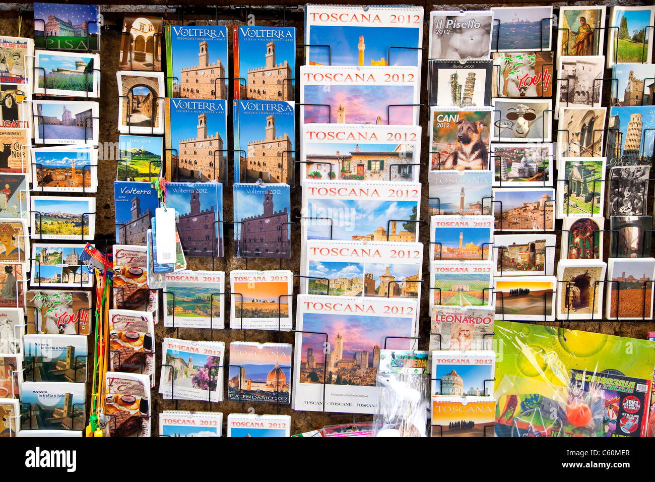 Postcards and guidebooks for sale in Volterra, Pisa, Tuscany, Italy, Europe Stock Photo
