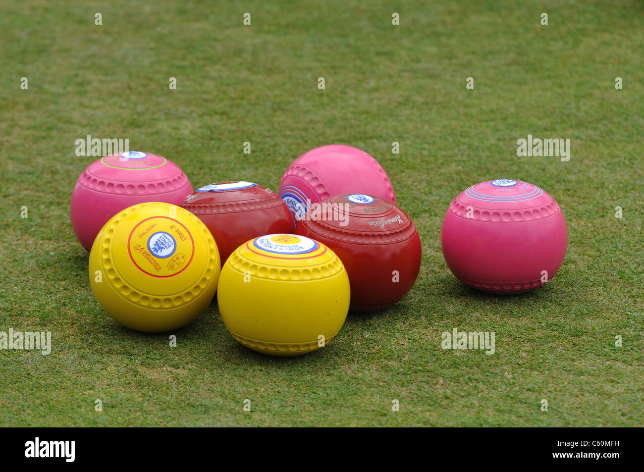Coloured lawn bowls Stock Photo Alamy
