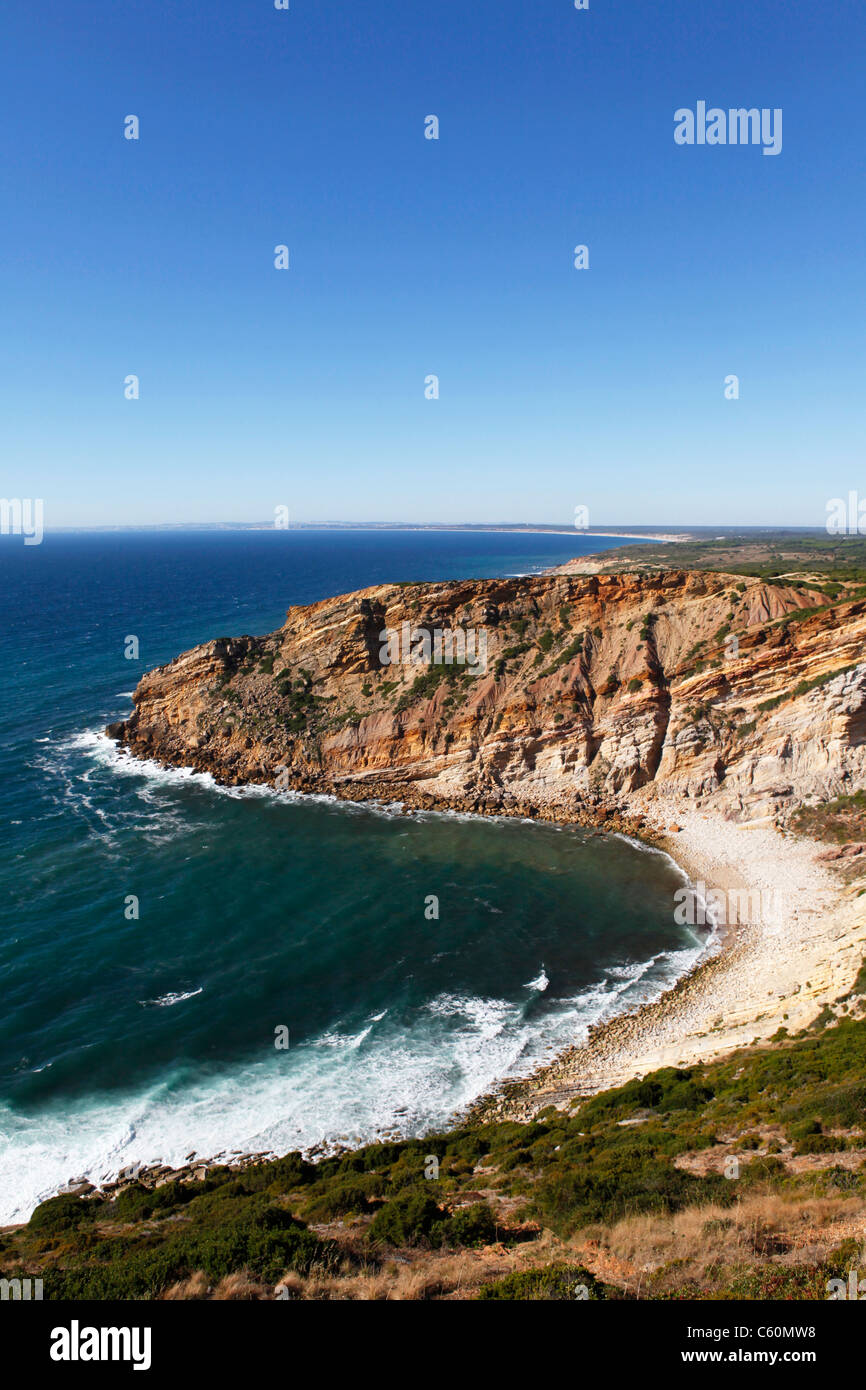 Jurassic era cliffs fall into the Atlantic Ocean at Cape Espichel (Cabo Espichel) close to Setubal in Portugal. Stock Photo