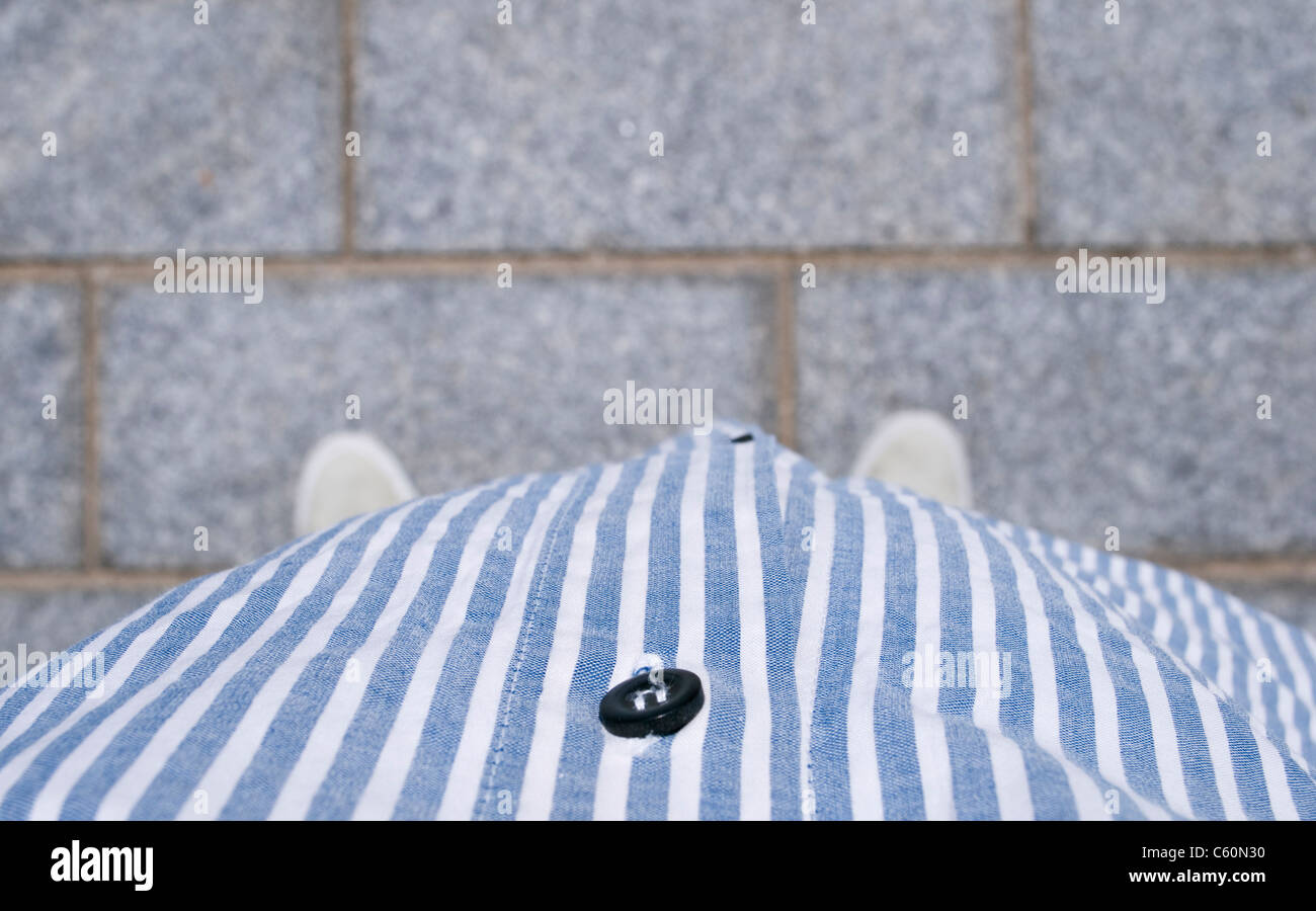 downward view of man paunch Stock Photo