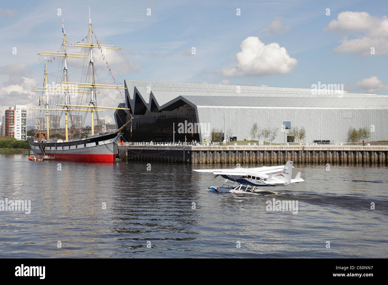 Riverside Museum Glasgow of Transport and Travel and the Tall Ship Glenlee on the River Clyde, Glasgow, Scotland, UK with the Loch Lomond seaplane Stock Photo