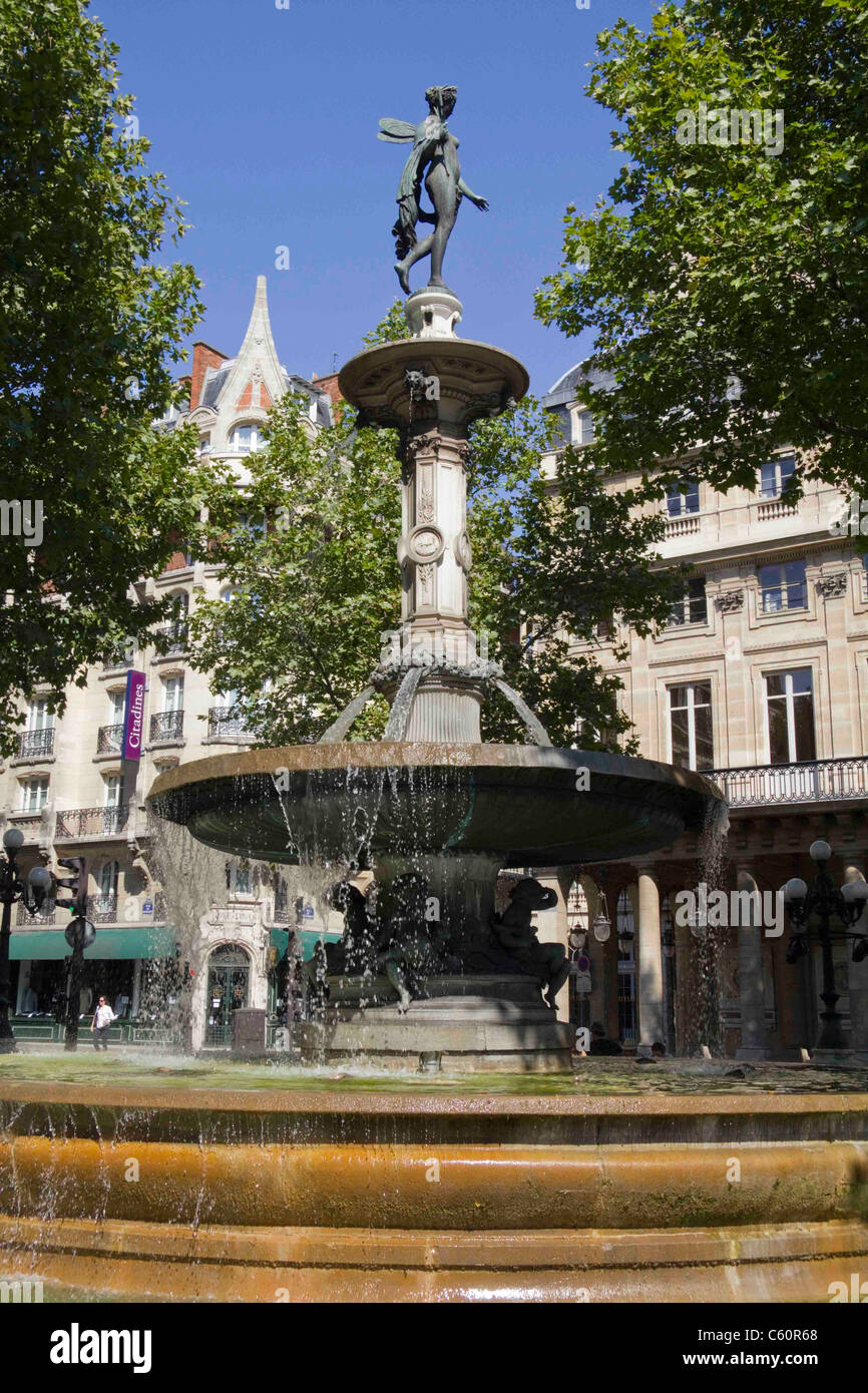 Bronze female winged statue on top of fountain in central Paris France Stock Photo Alamy