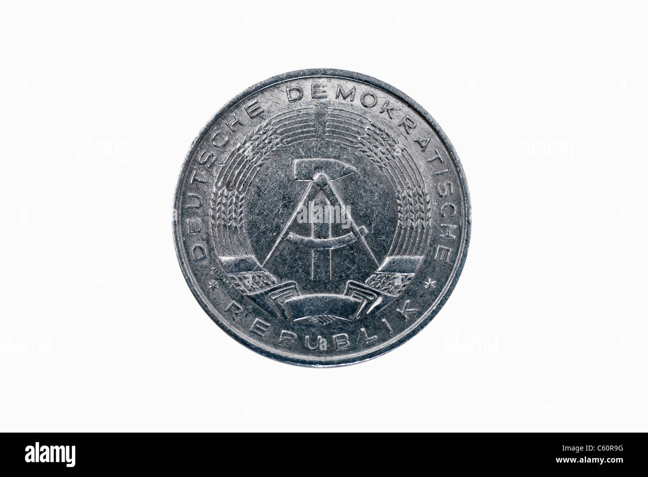 Detailansicht einer 10 Pfennig Münze aus der DDR aus dem Jahr 1981 | Detail photo of a 10 Pfennig coin of GDR from the year 1981 Stock Photo