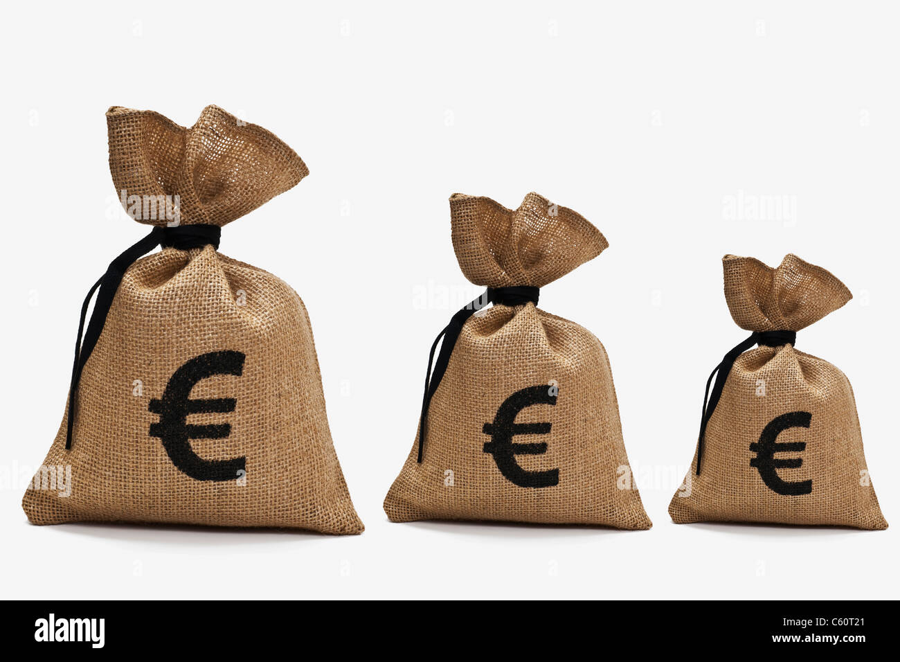 three different big money bags with euro sign next to each other Stock Photo