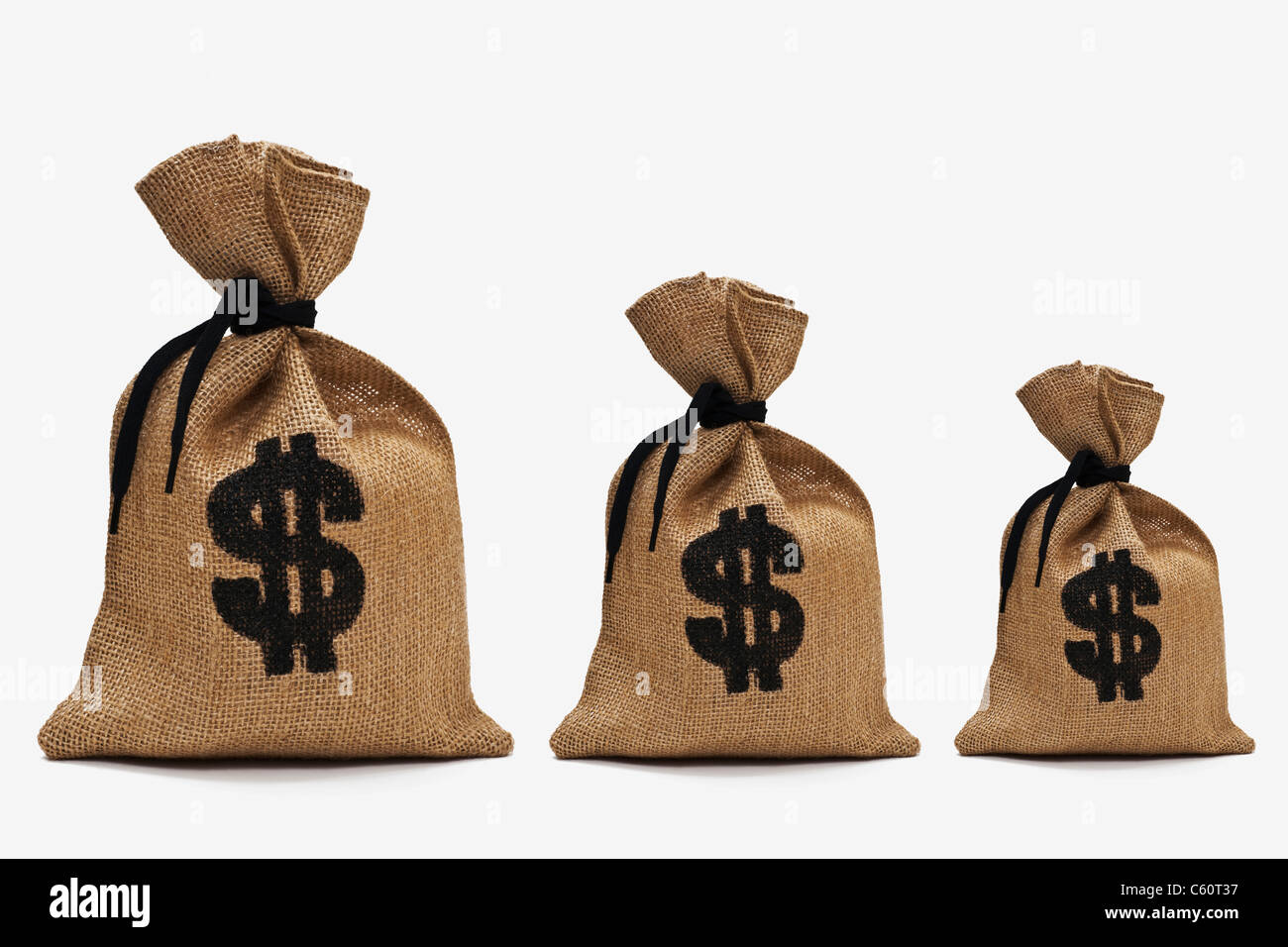 three different big money bags with dollar sign next to each other Stock Photo