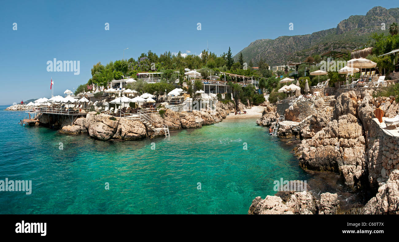 Premium Photo  Beautiful blue water of mediterranean sea  beachcoastlinebreathtaking view at seaside and rocksnice bay in turkey  region of kalkan kas