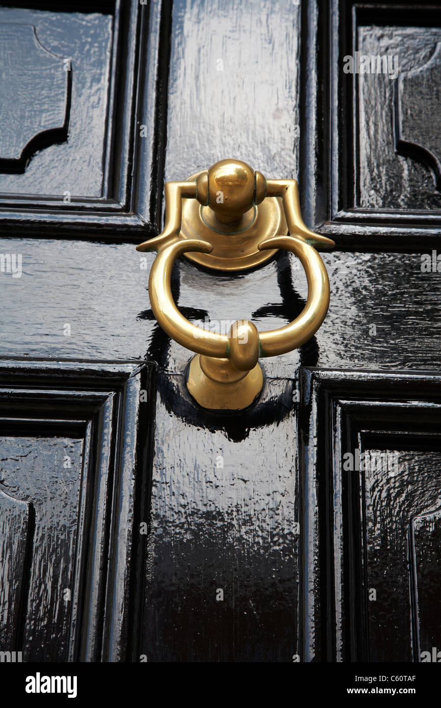 Close up of a brass door knocker on Victorian door in the UK Stock Photo