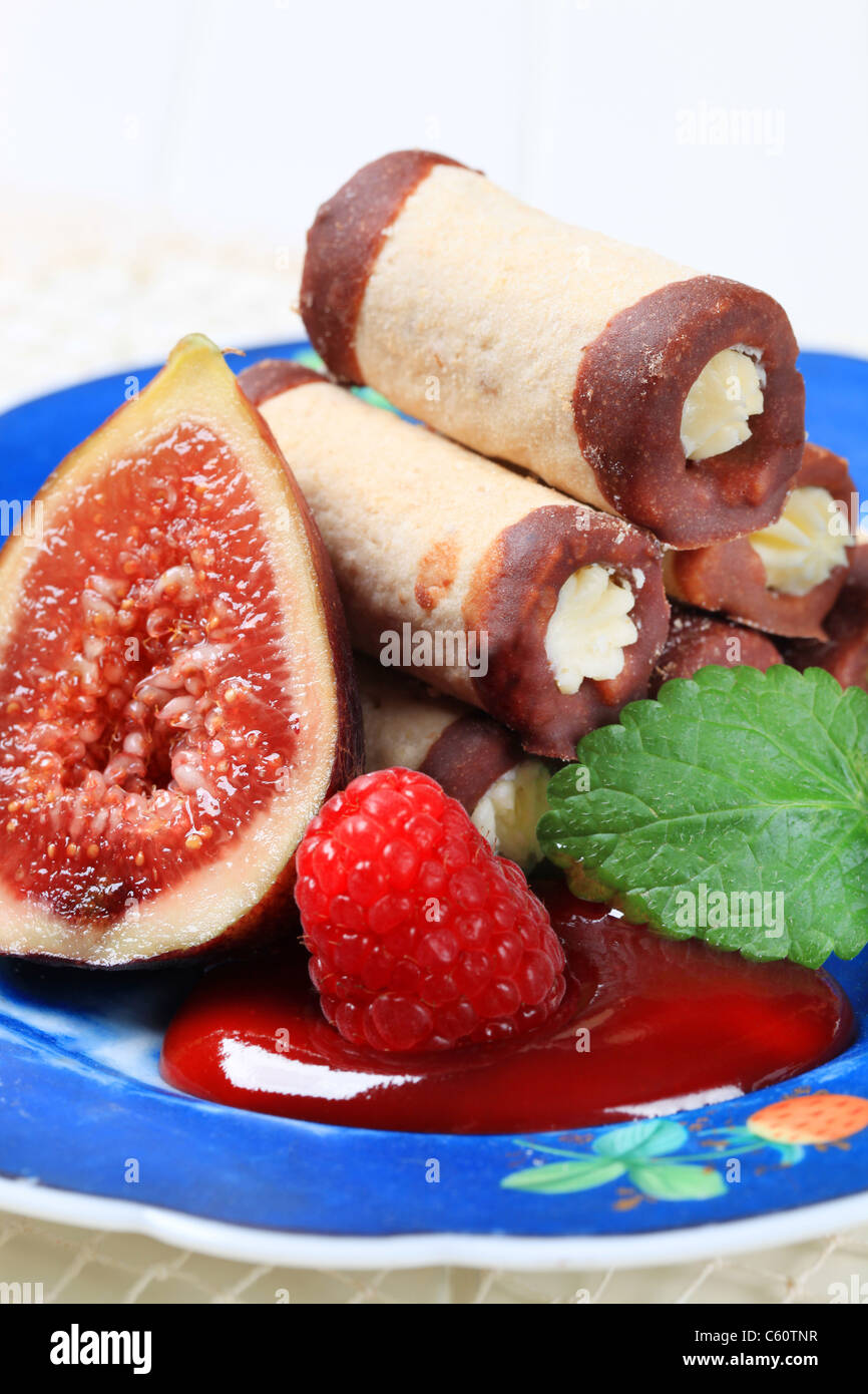 Tubeshaped pastry shells filled with sweet creamy filling Stock Photo