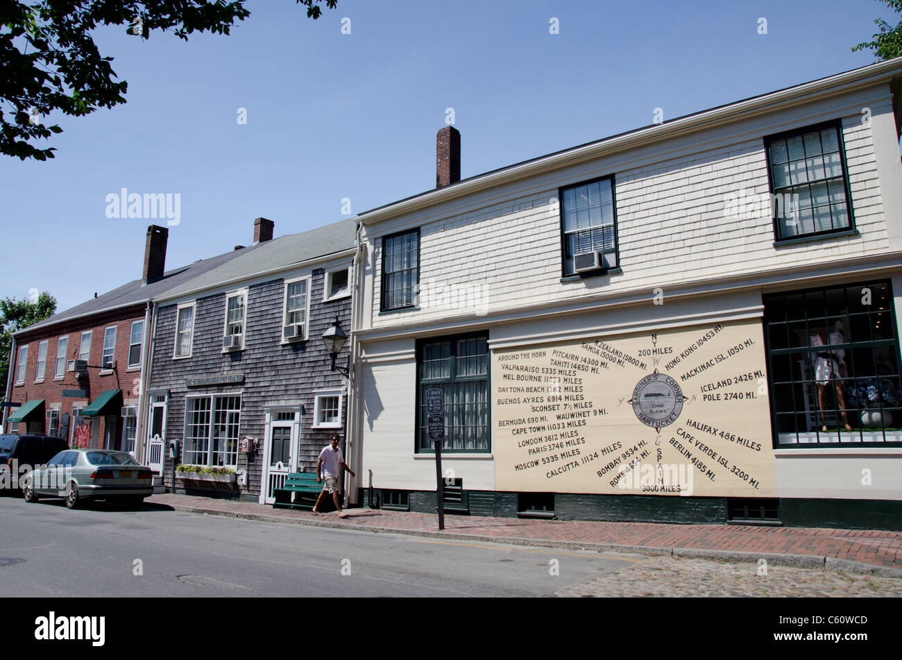 Massachusetts, Nantucket Island. Nantucket directional marker on the side of downtown building. Stock Photo