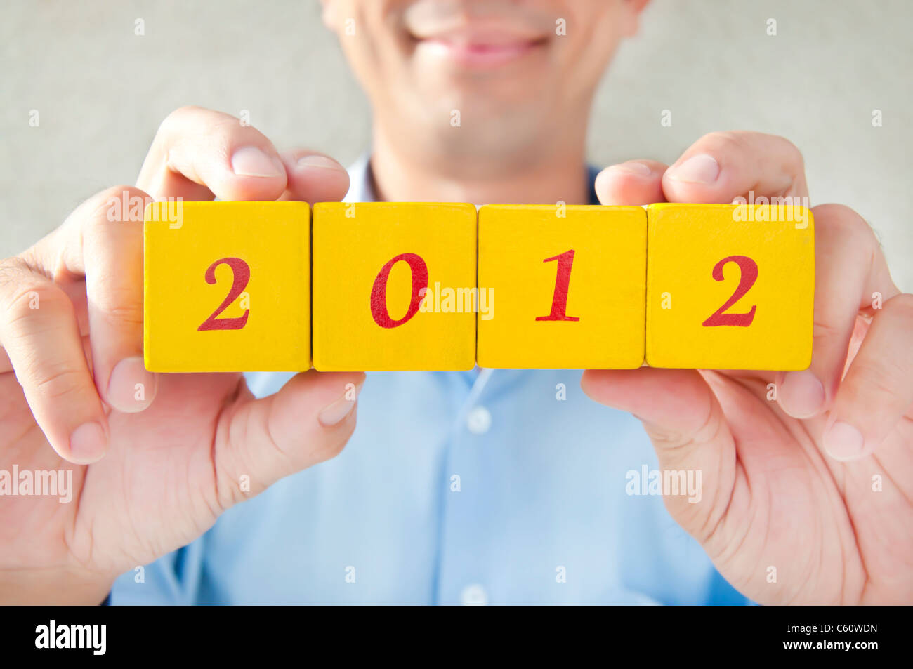 Salesman holding blocks Stock Photo