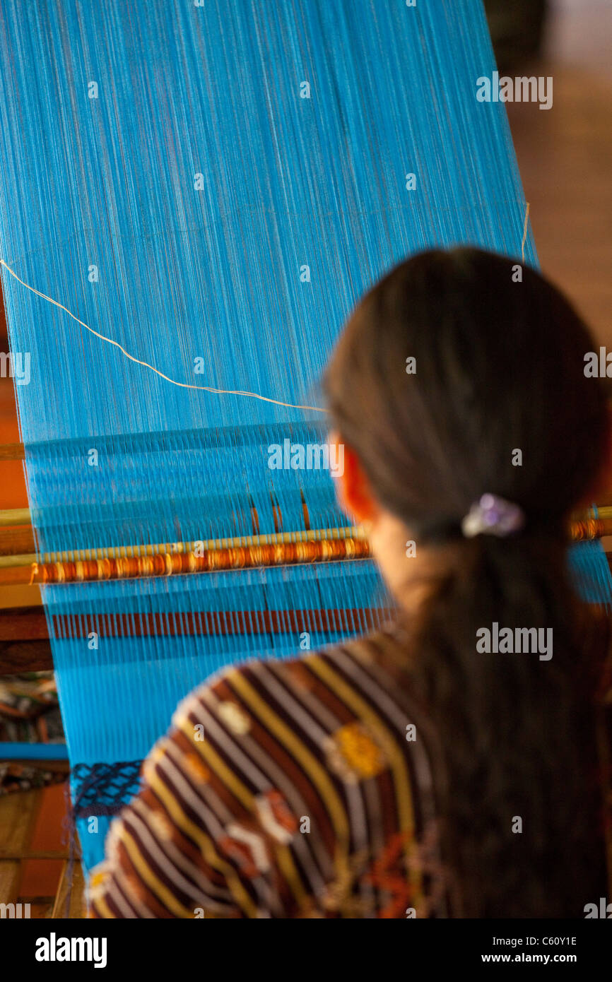 Indigenous woman weaving, Antigua, Guatemala Stock Photo