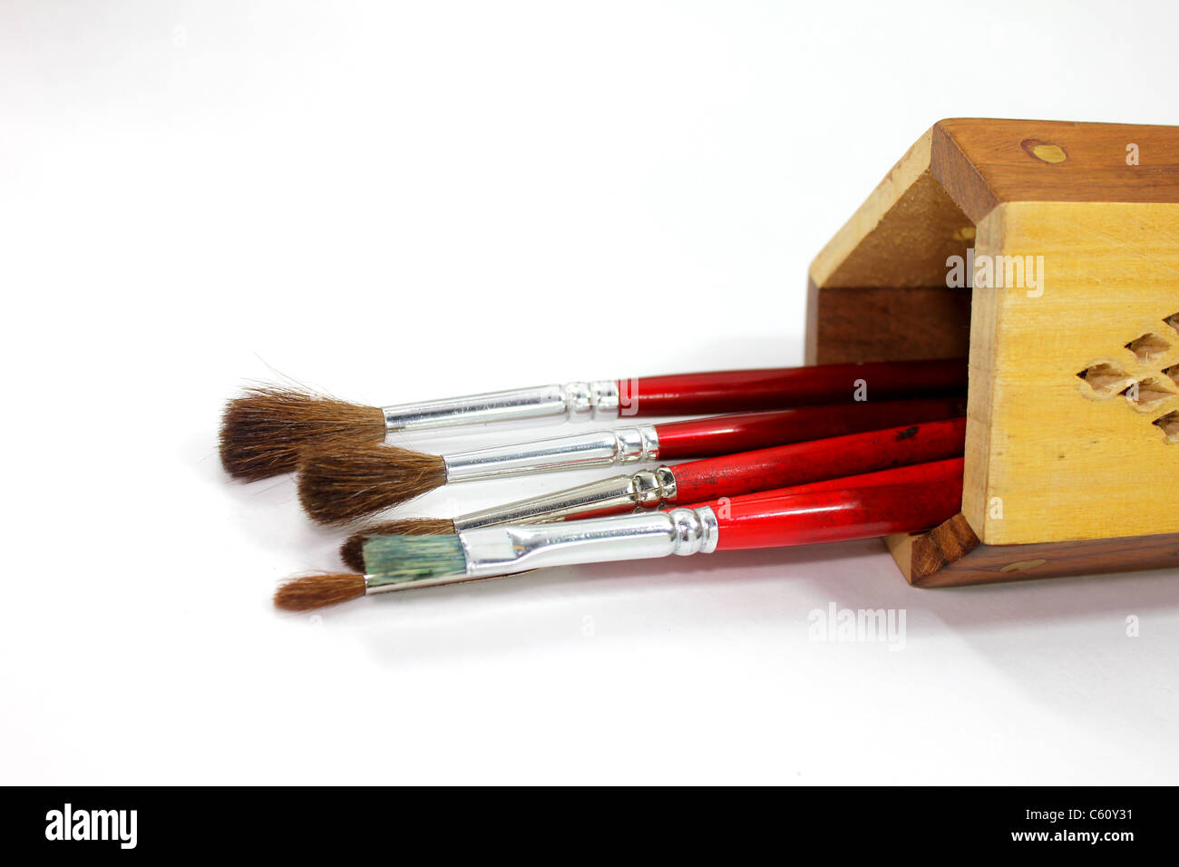 paint brush with wooden stand on white background Stock Photo - Alamy
