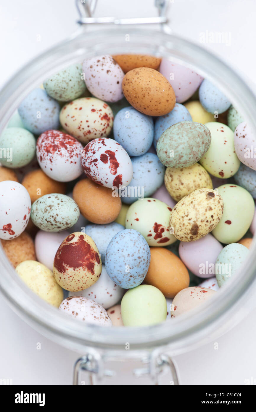 Chocolate mini eggs in a glass jar Stock Photo Alamy